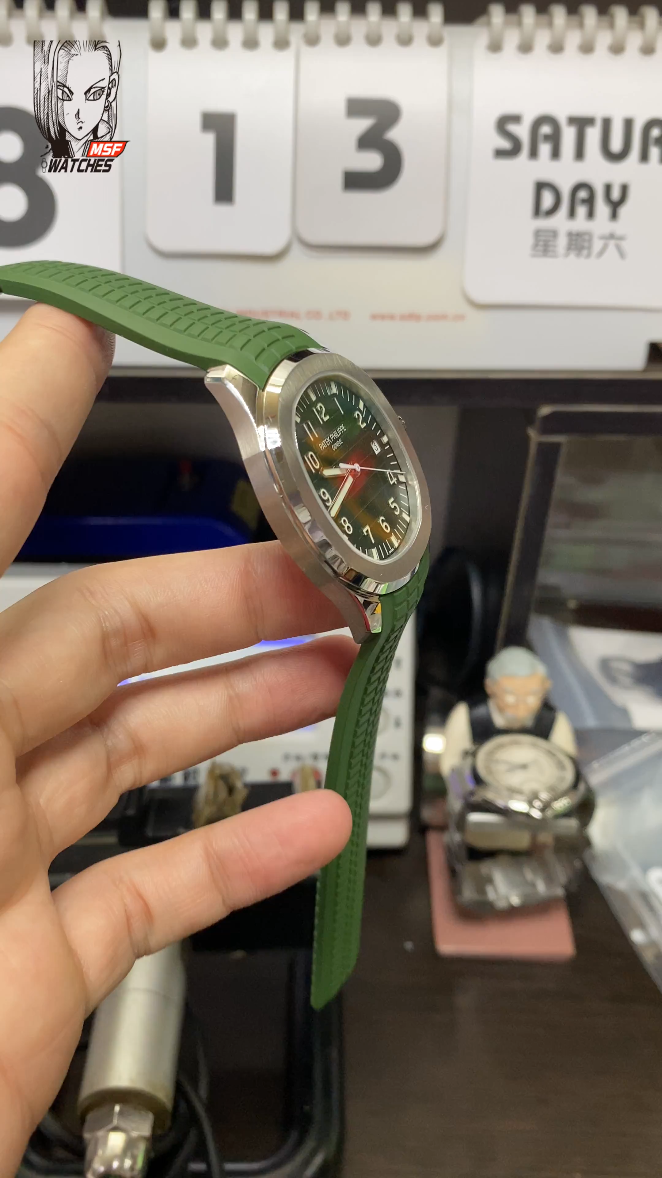 Patek Philippe Aquanaut Series 5168G-010, Green Dial Green Rubber Strap, 42.2mm Size.
