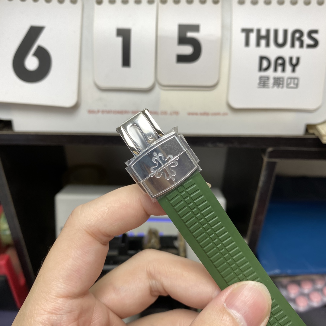 Patek Philippe Aquanaut Series 5168G-010, Green Dial Green Rubber Strap, 42.2mm Size.