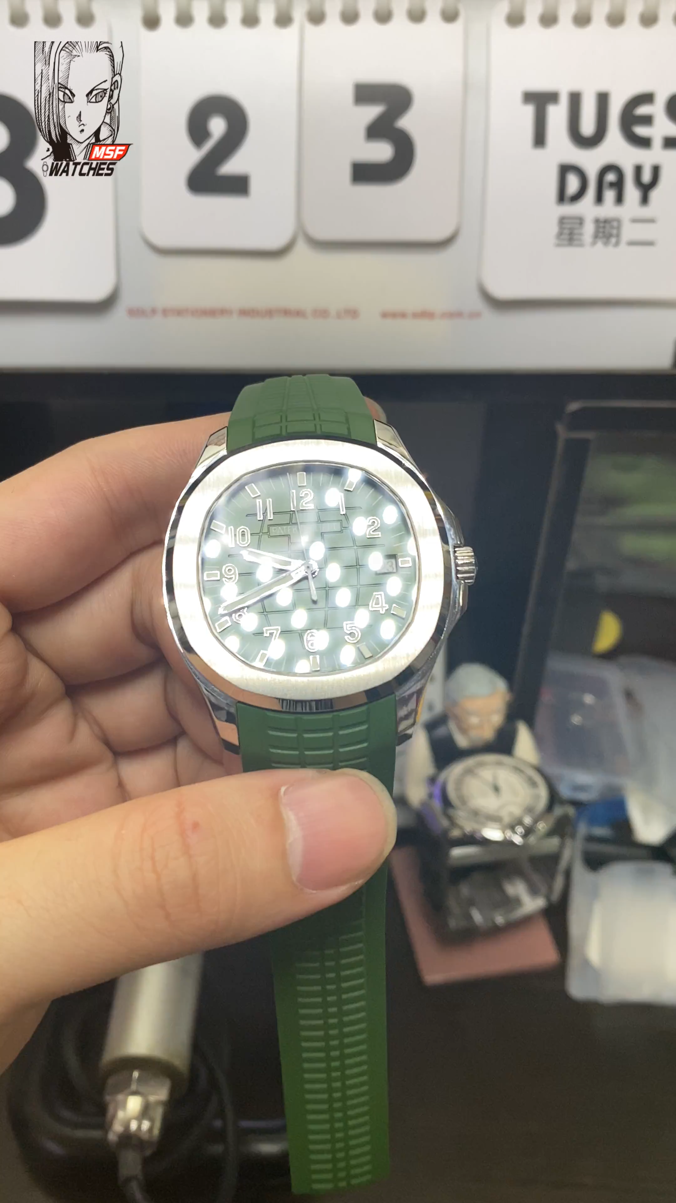 Patek Philippe Aquanaut Series 5168G-010, Green Dial Green Rubber Strap, 42.2mm Size.