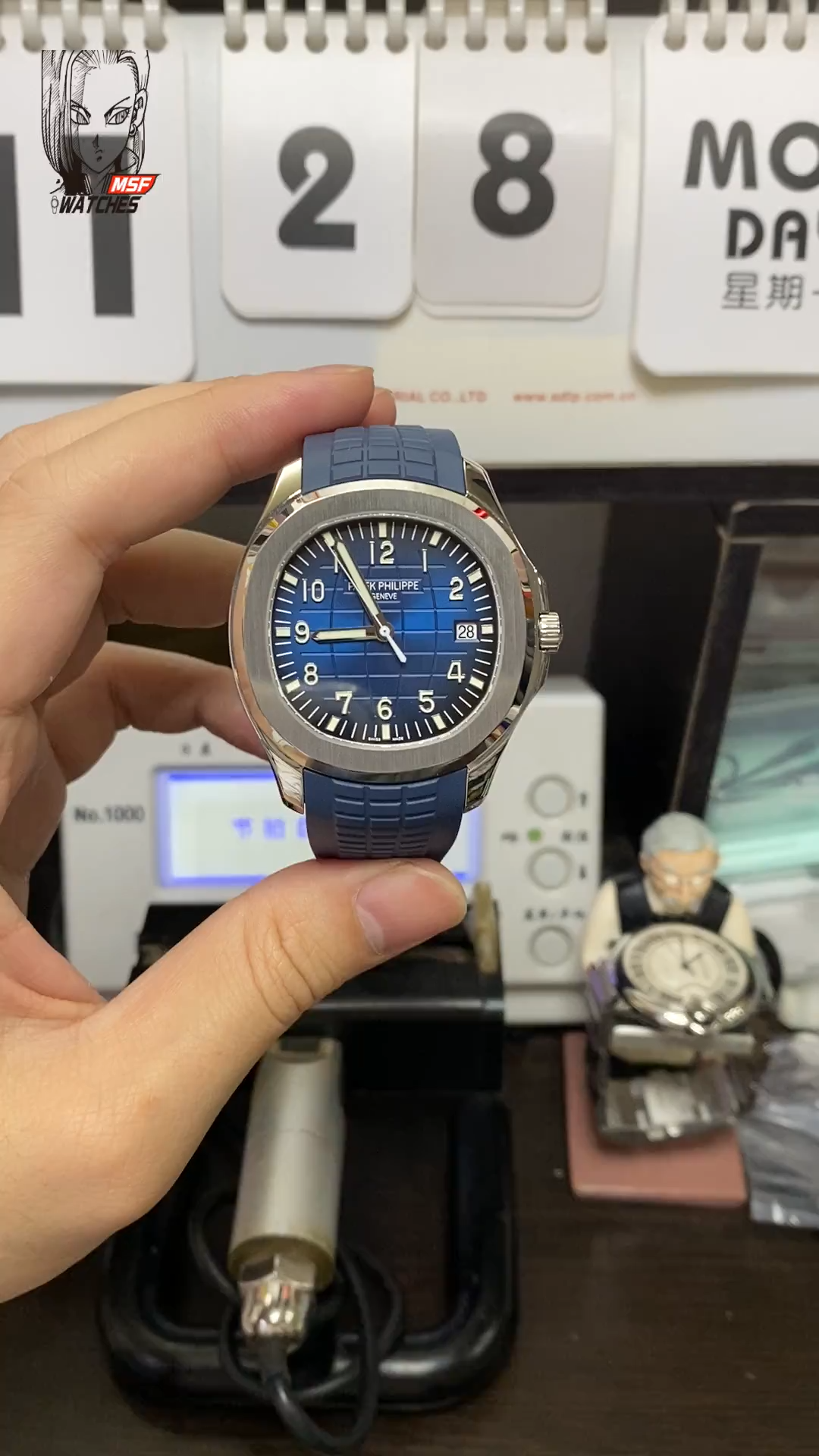 Patek Philippe Aquanaut Series 5168G-001, Gradient Blue Dial Blue Rubber Strap, 42.2mm Size.