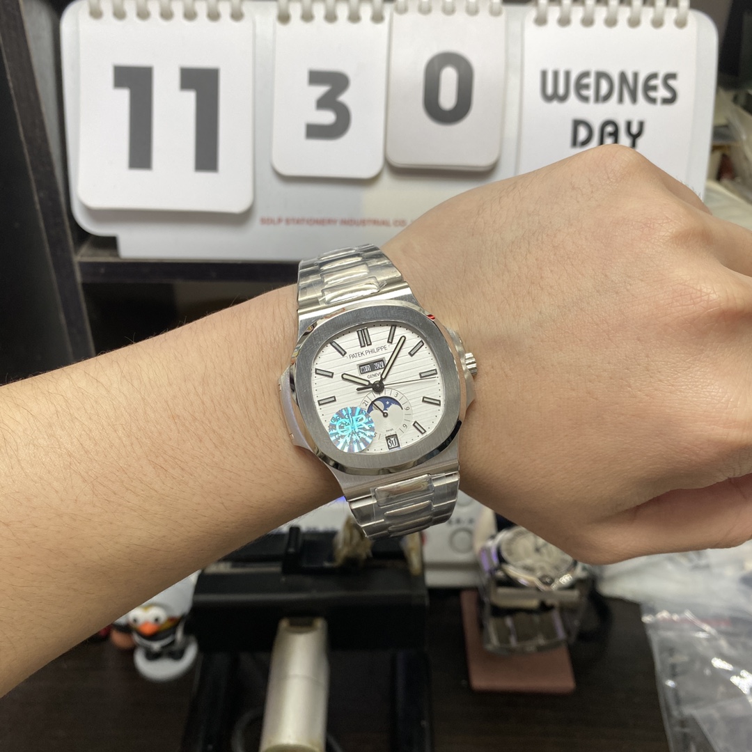 Patek Philippe Nautilus series 57261A-010, White Dial, Complete Month Day Date and Moon Phase Functions, 40.5mm Size.