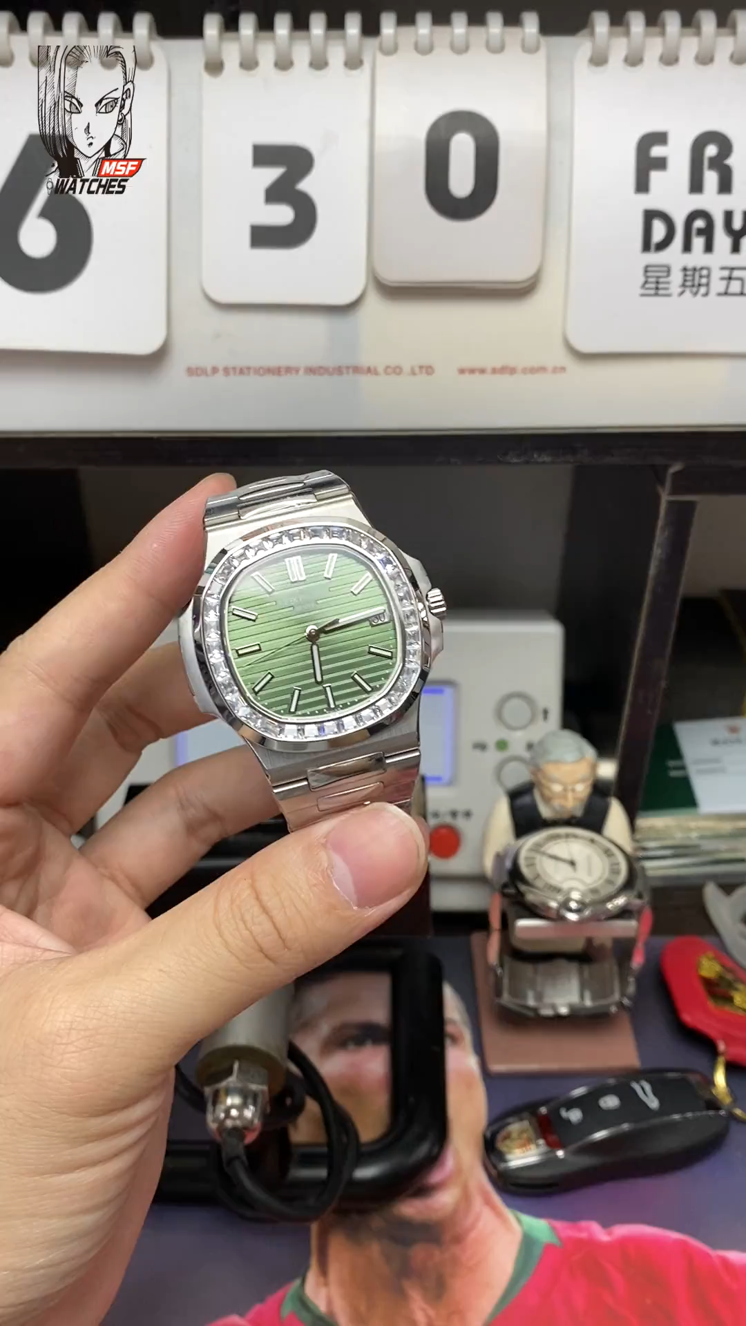 Patek Philippe Nautilus series 57111300A-001, Olive Green Dial with Square Diamond Bezel, 40mm Size.
