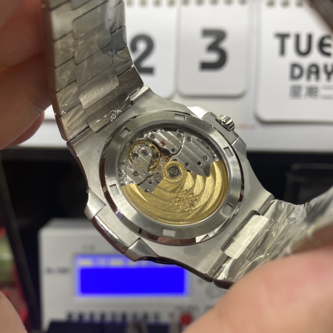 Patek Philippe Nautilus series 57111300A-001, Olive Green Dial with Square Diamond Bezel, 40mm Size.