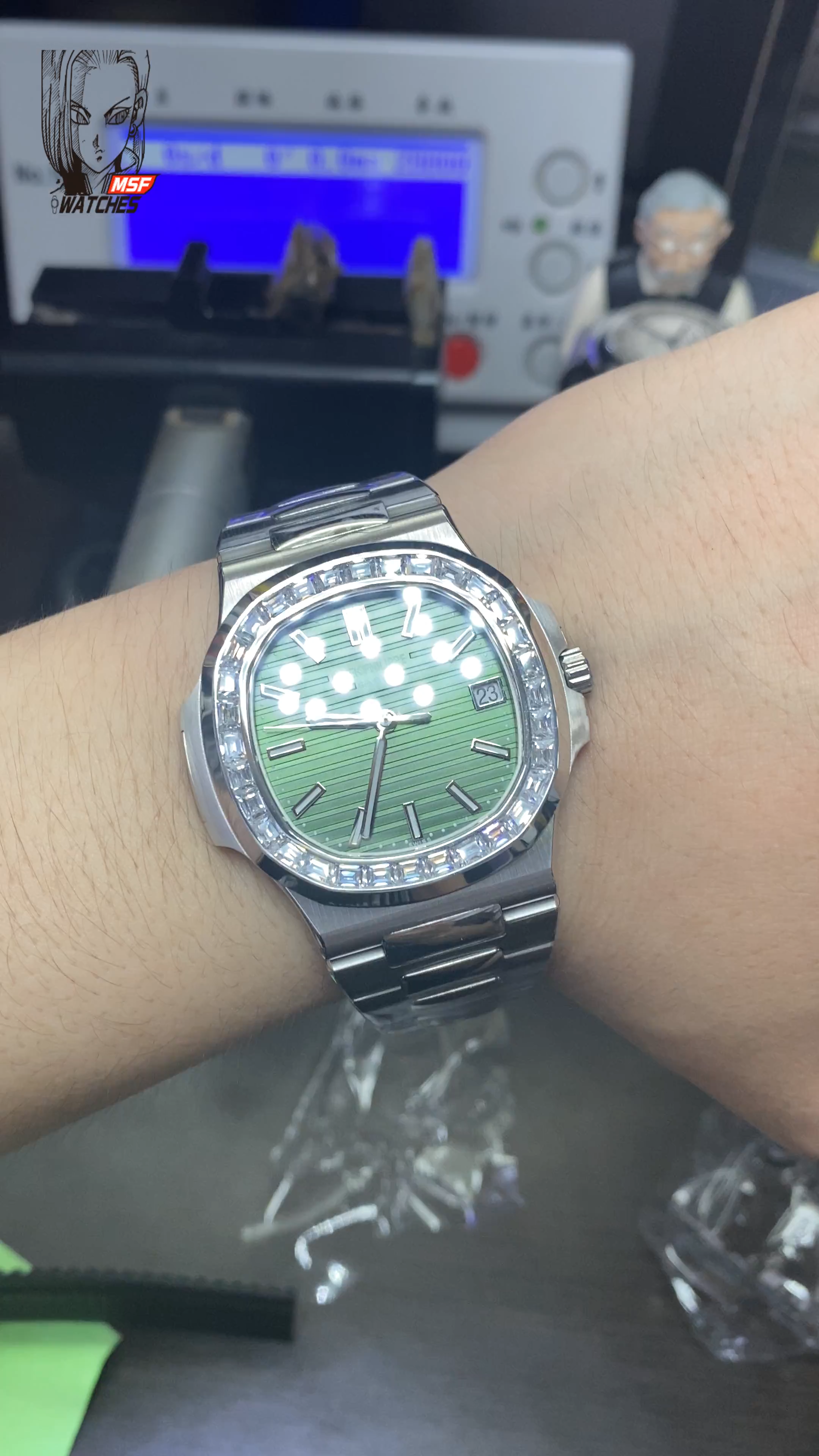 Patek Philippe Nautilus series 57111300A-001, Olive Green Dial with Square Diamond Bezel, 40mm Size.
