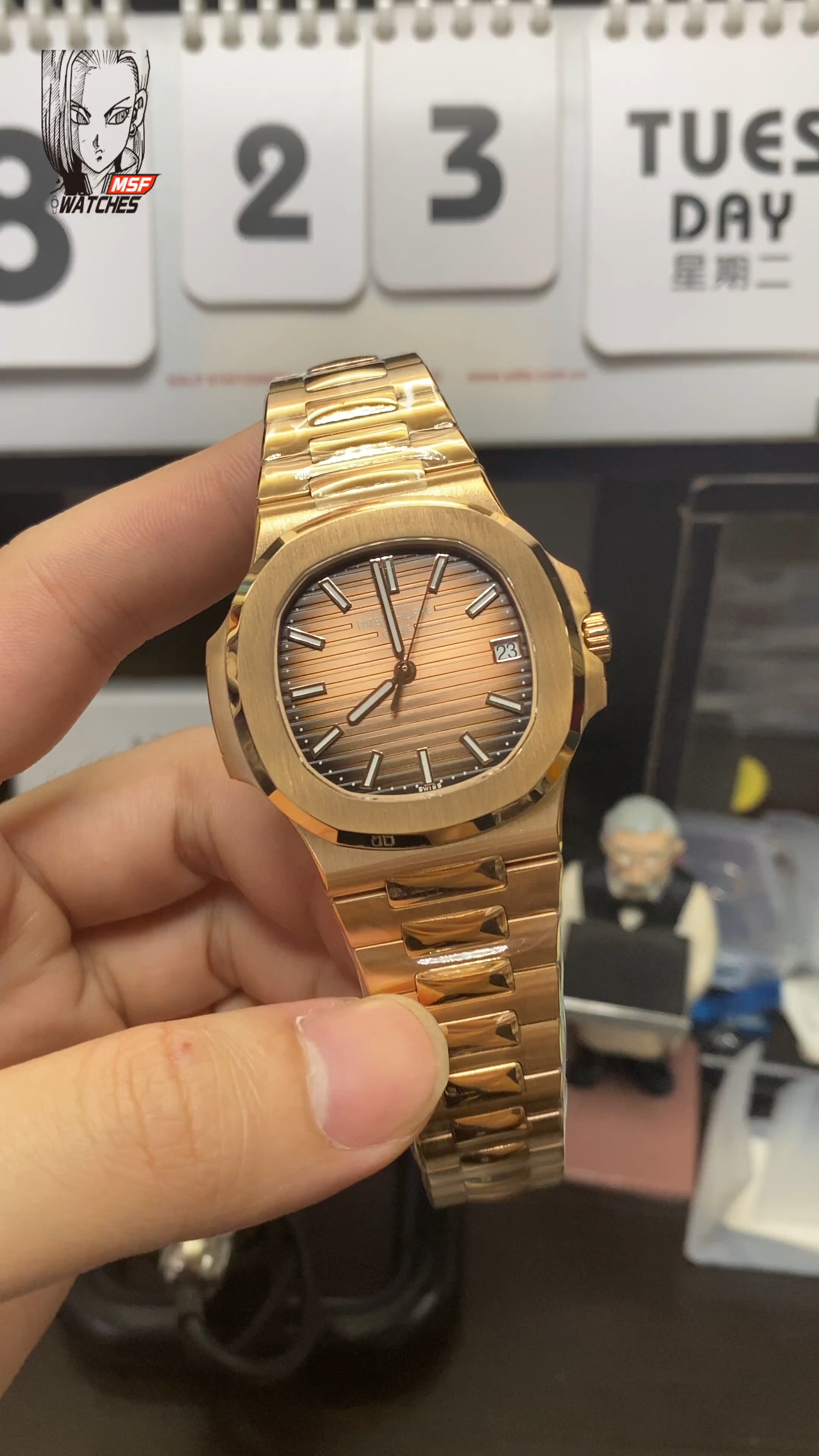 Patek Philippe Nautilus series 57111R-001, Rose Gold Case with Gradient Dark Brown Dial Steel Bracelet, 40mm Size.