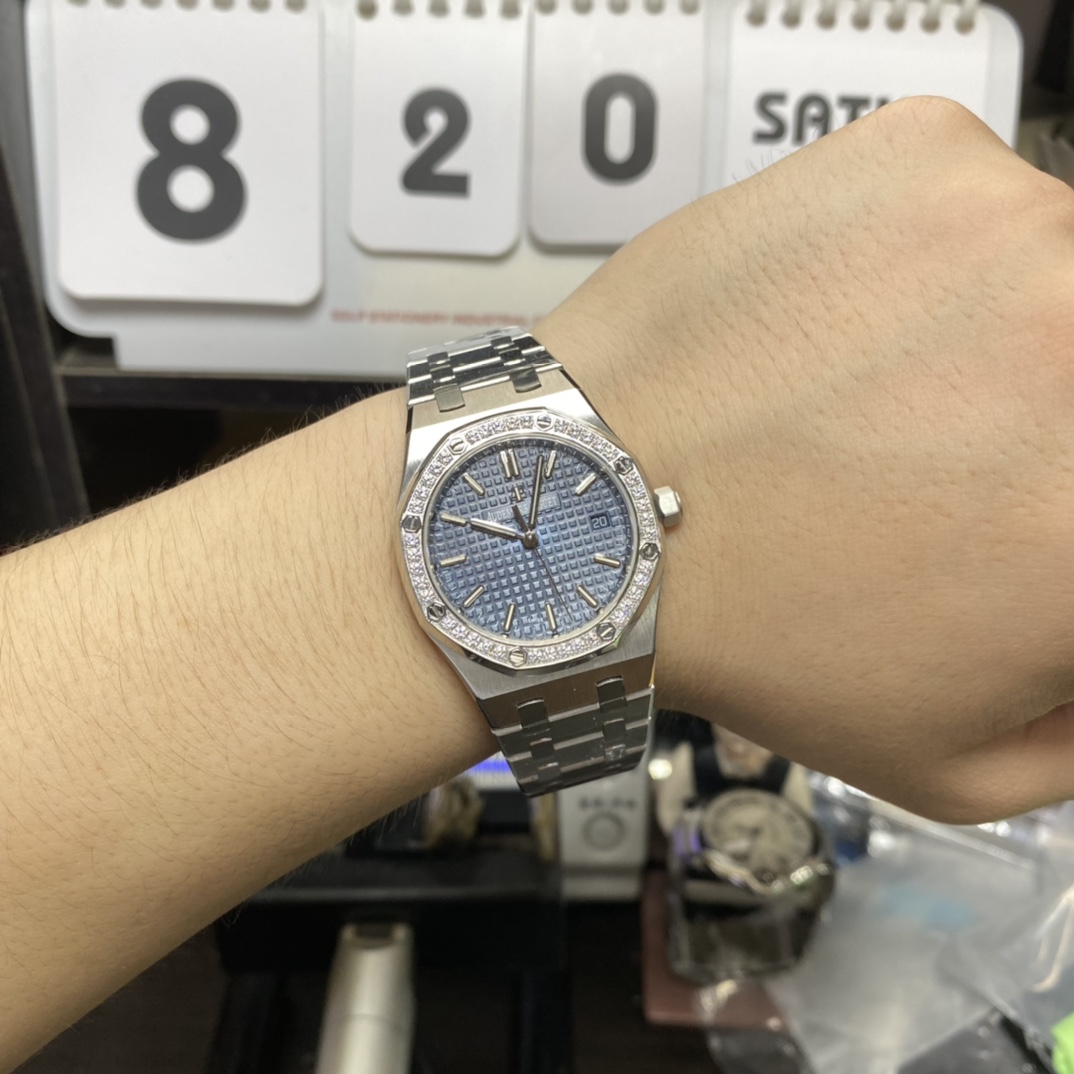 Audemars Piguet Royal Oak Offshore Series 77451ST.ZZ.1361ST.04, Blue Dial Gem-Set Bezel Mechanical Movement, 34mm Size.