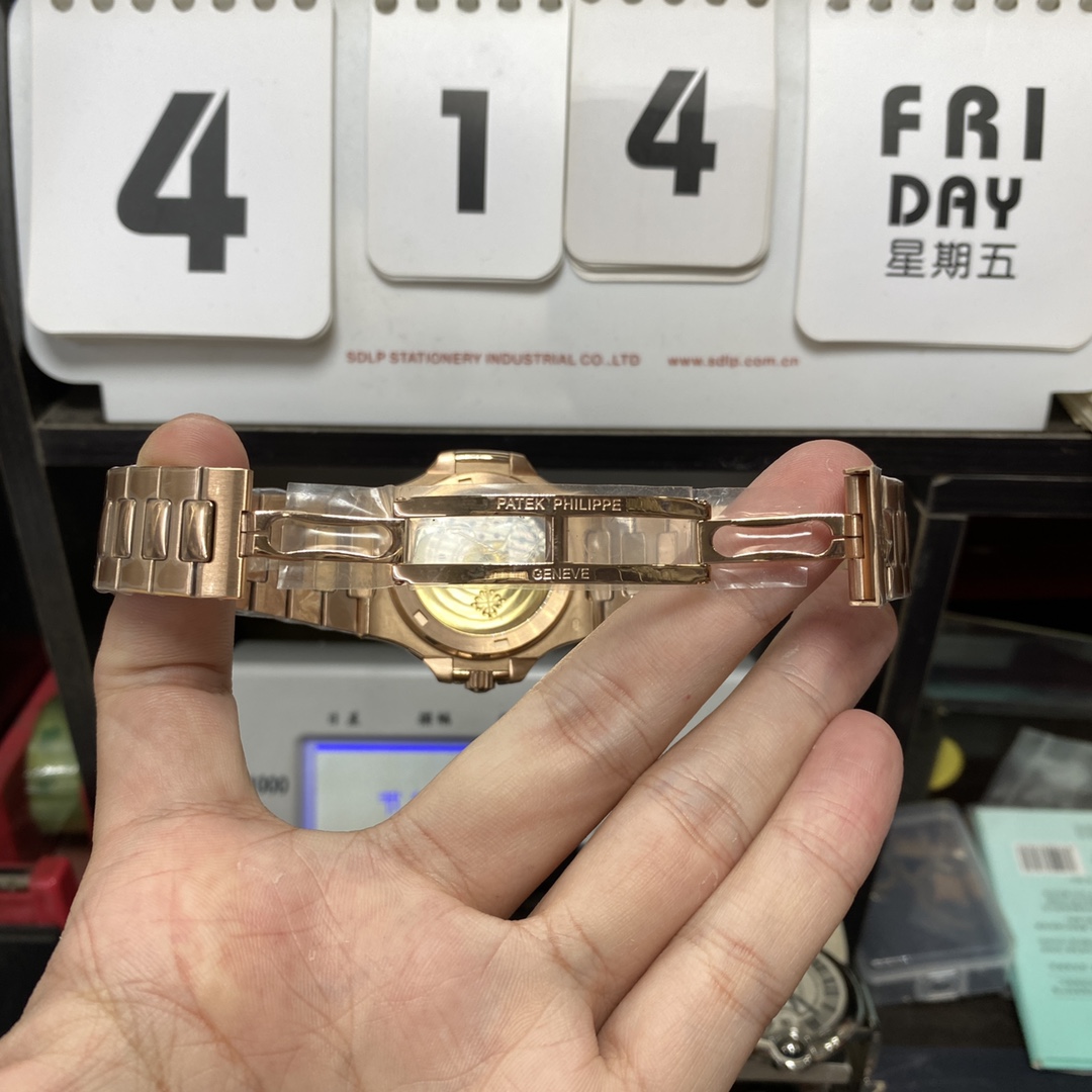 Patek Philippe Nautilus series 57111R-001, Coffee Dial Rose Gold Case Steel Bracelet, 40mm size.