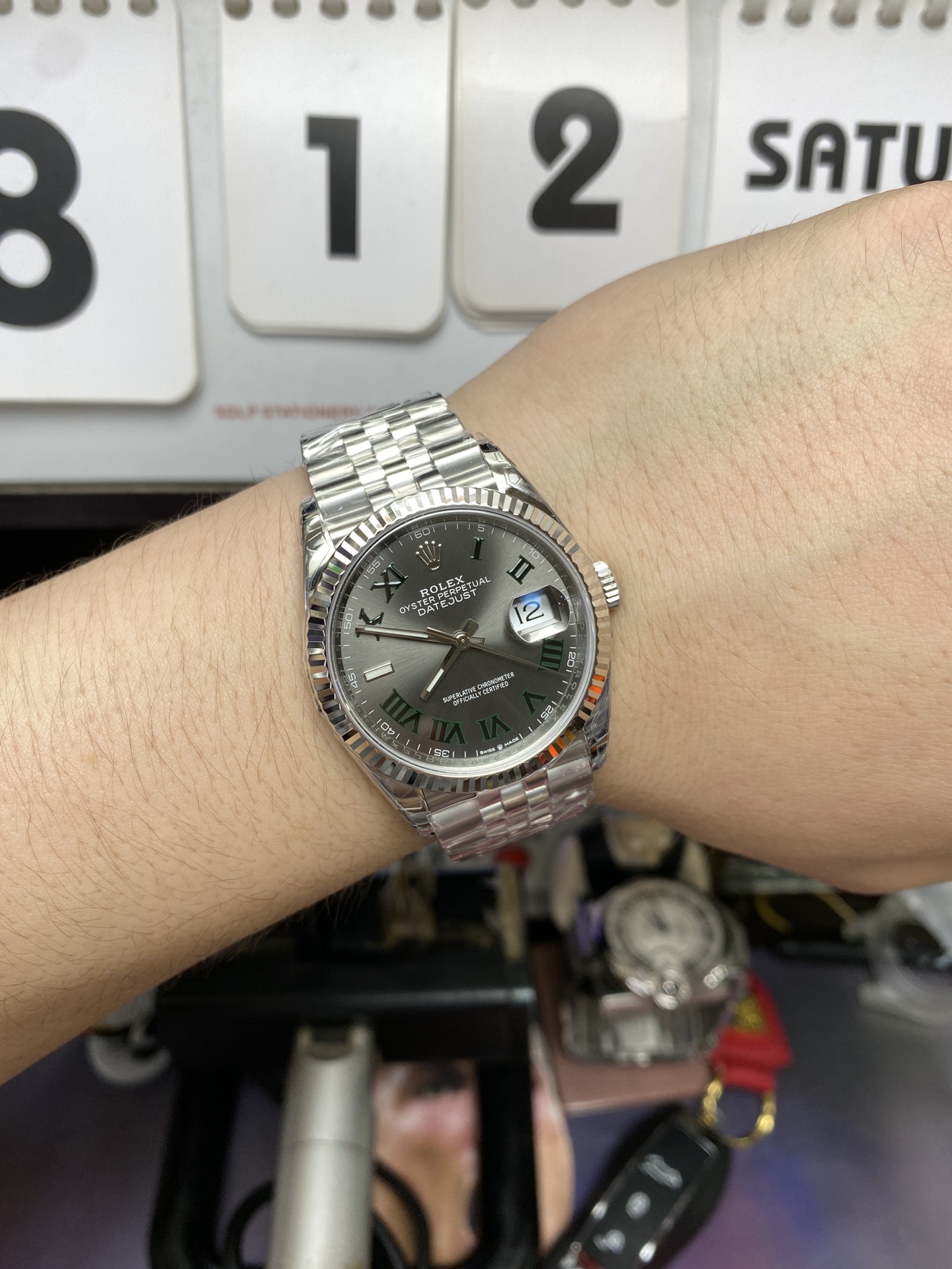 Rolex Datejust series m126234-0045, Green Roman Numerals on a Green Dial, 36mm size.