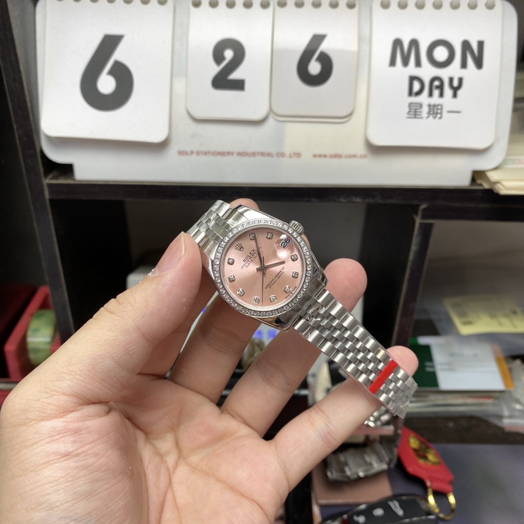 Rolex Datejust series m278384rbr-0036, Pink Dial with Diamond Bezel, 31mm size, Jubilee stainless steel bracelet.
