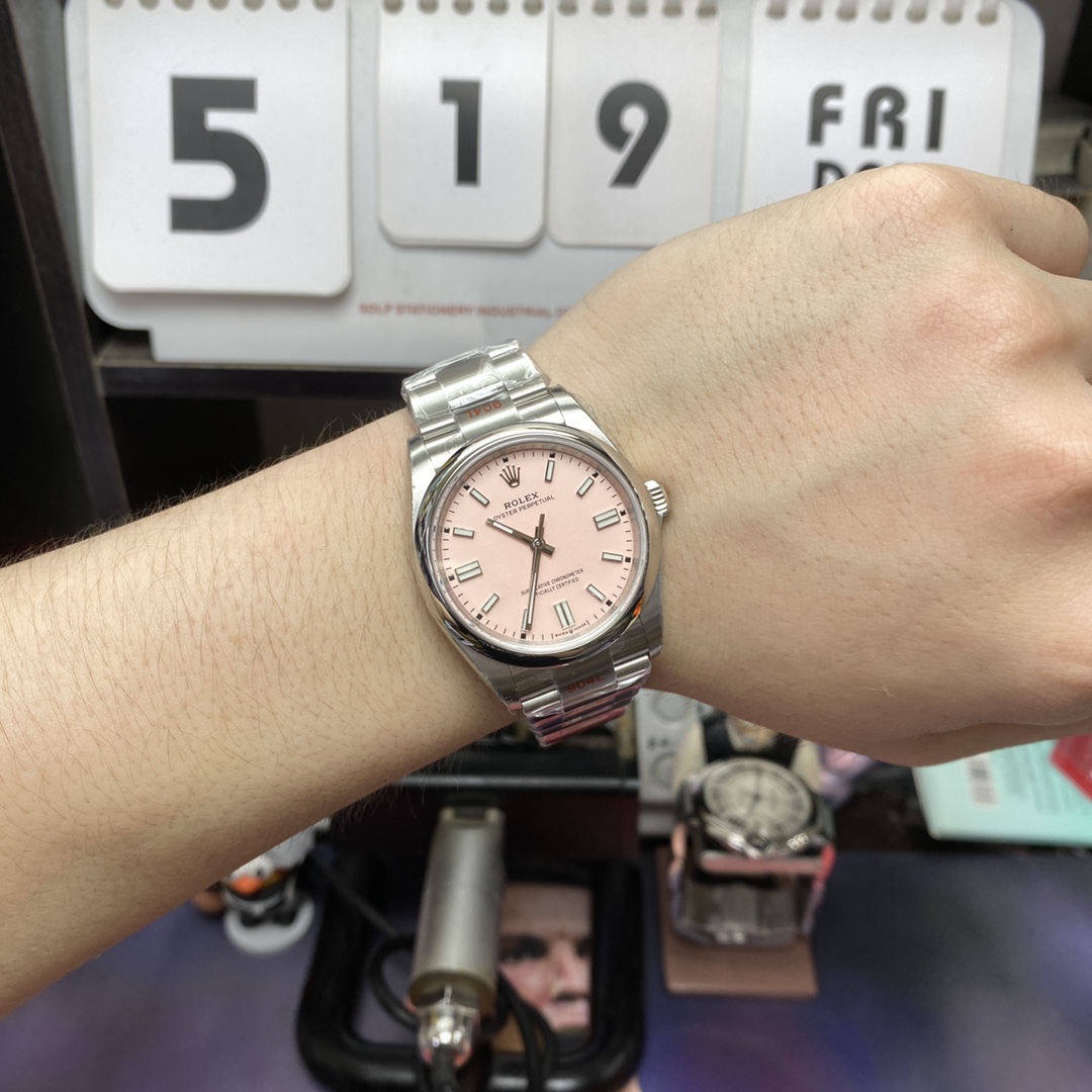Rolex Oyster Perpetual Series m126000-0008, Pink Dial, 36mm size.