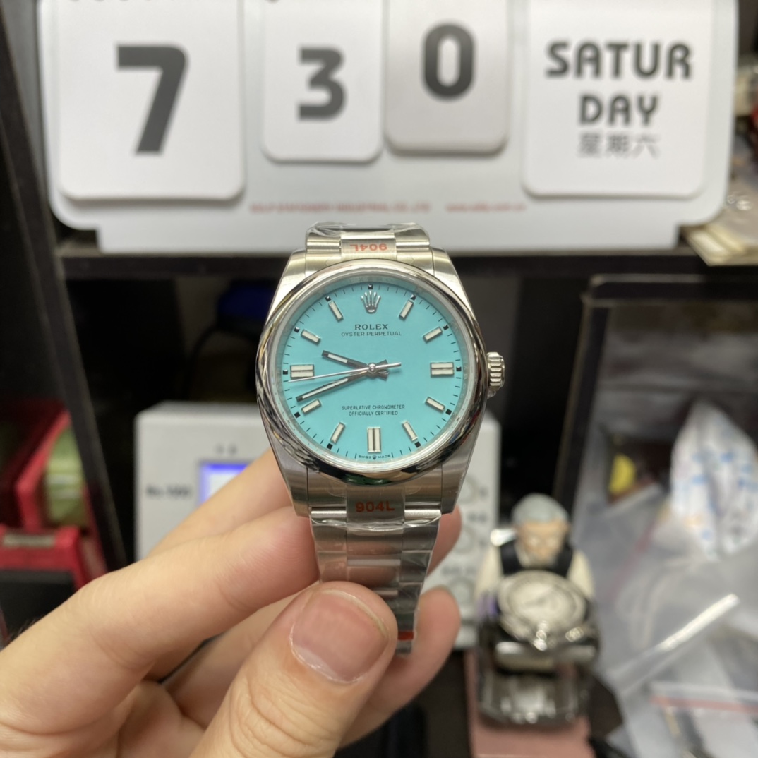 Rolex Oyster Perpetual Series m126000-0006, Tiffany Blue Dial, 36mm size.