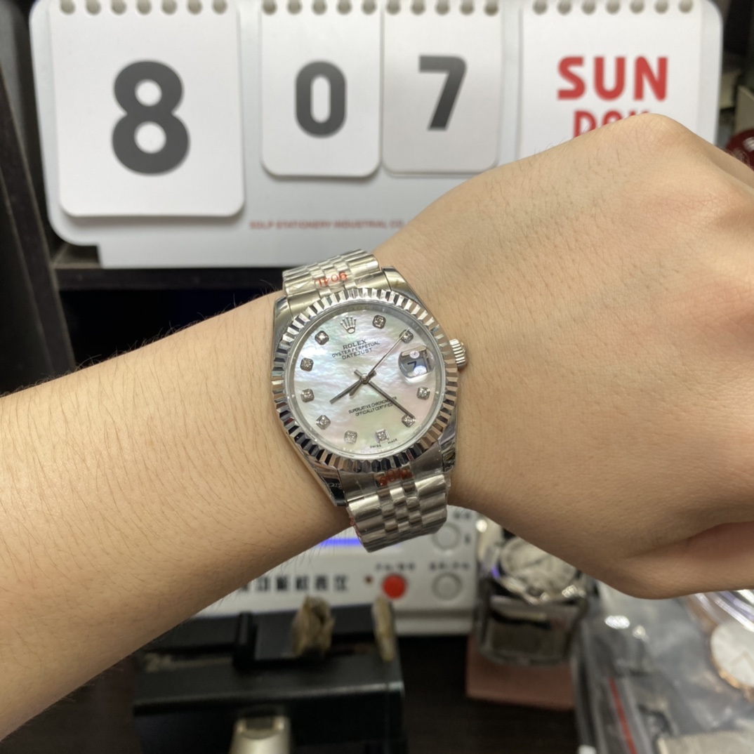 Rolex Datejust Series m126234-0019, White Mother-of-Pearl Dial with Diamond Hour Markers, 36mm size, Jubilee stainless steel bracelet.