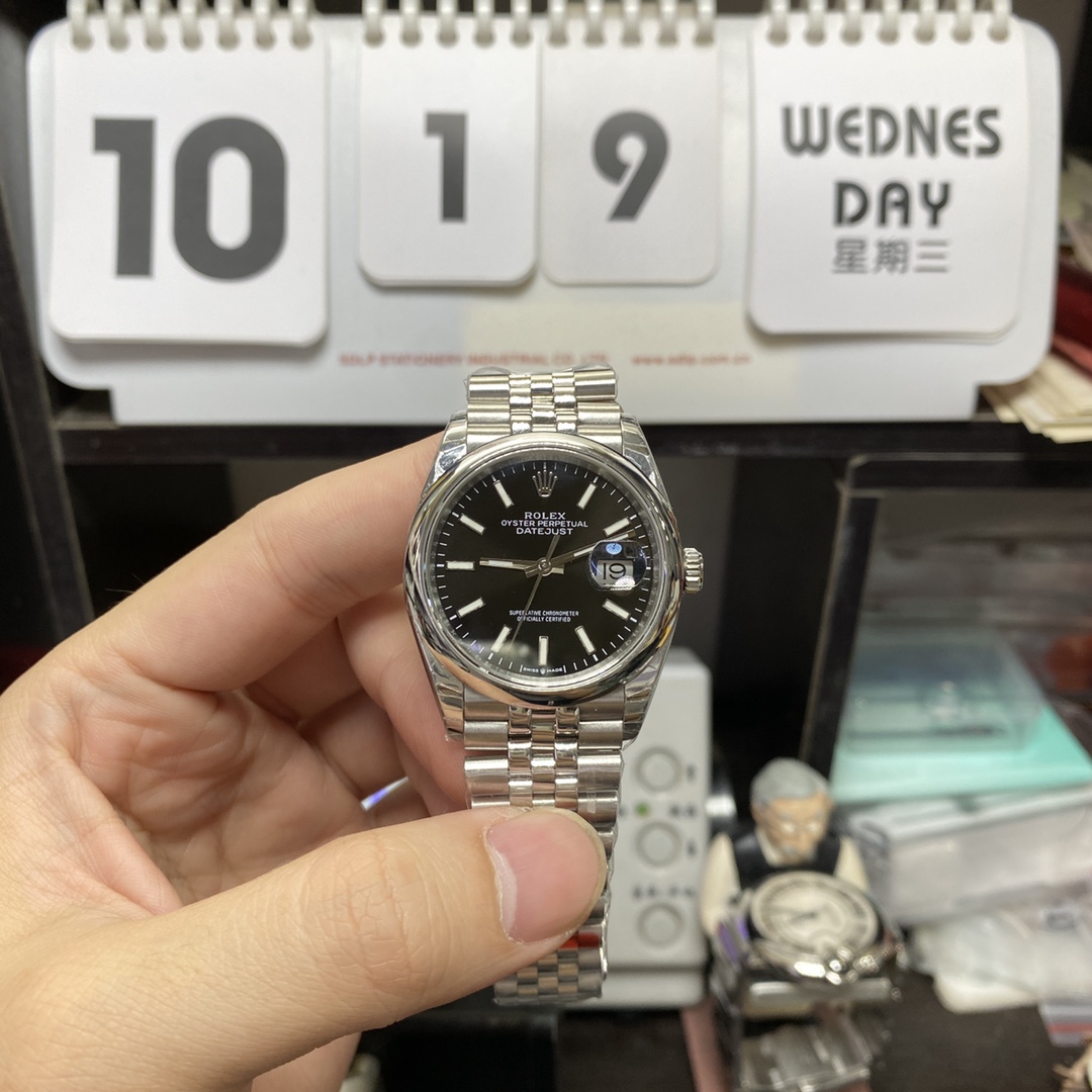 Rolex Datejust Series m126200-0003, Black Dial with Fluted Bezel and Five-link Bracelet, 36mm Size.