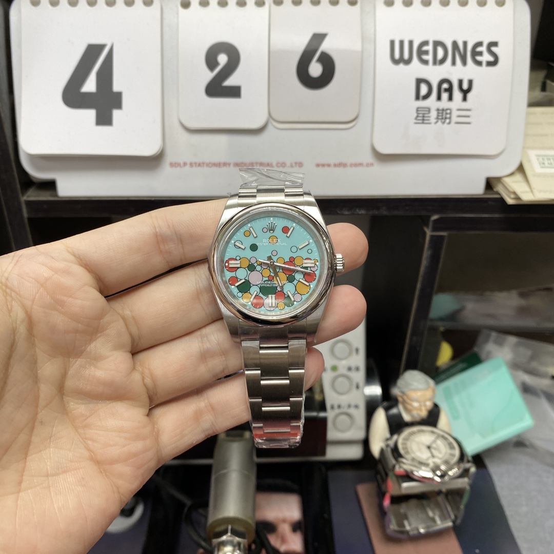 Rolex Oyster Perpetual series m126000-0009, Colorful Ball Tiffany Blue Dial, 36mm size.