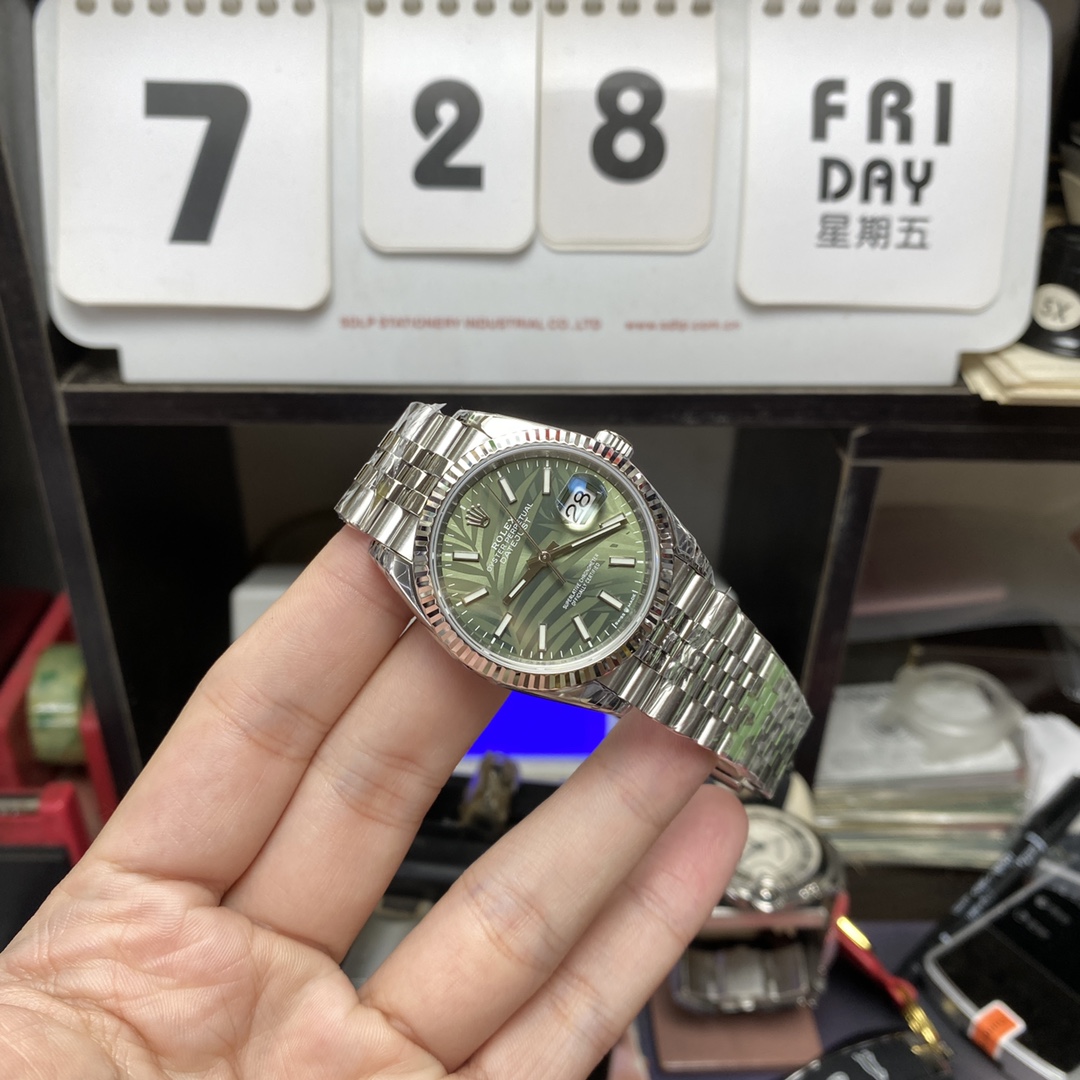 Rolex Datejust series m126234-0047, Palm Leaf Pattern on a Green Dial, 36mm size, Jubilee stainless steel bracelet.