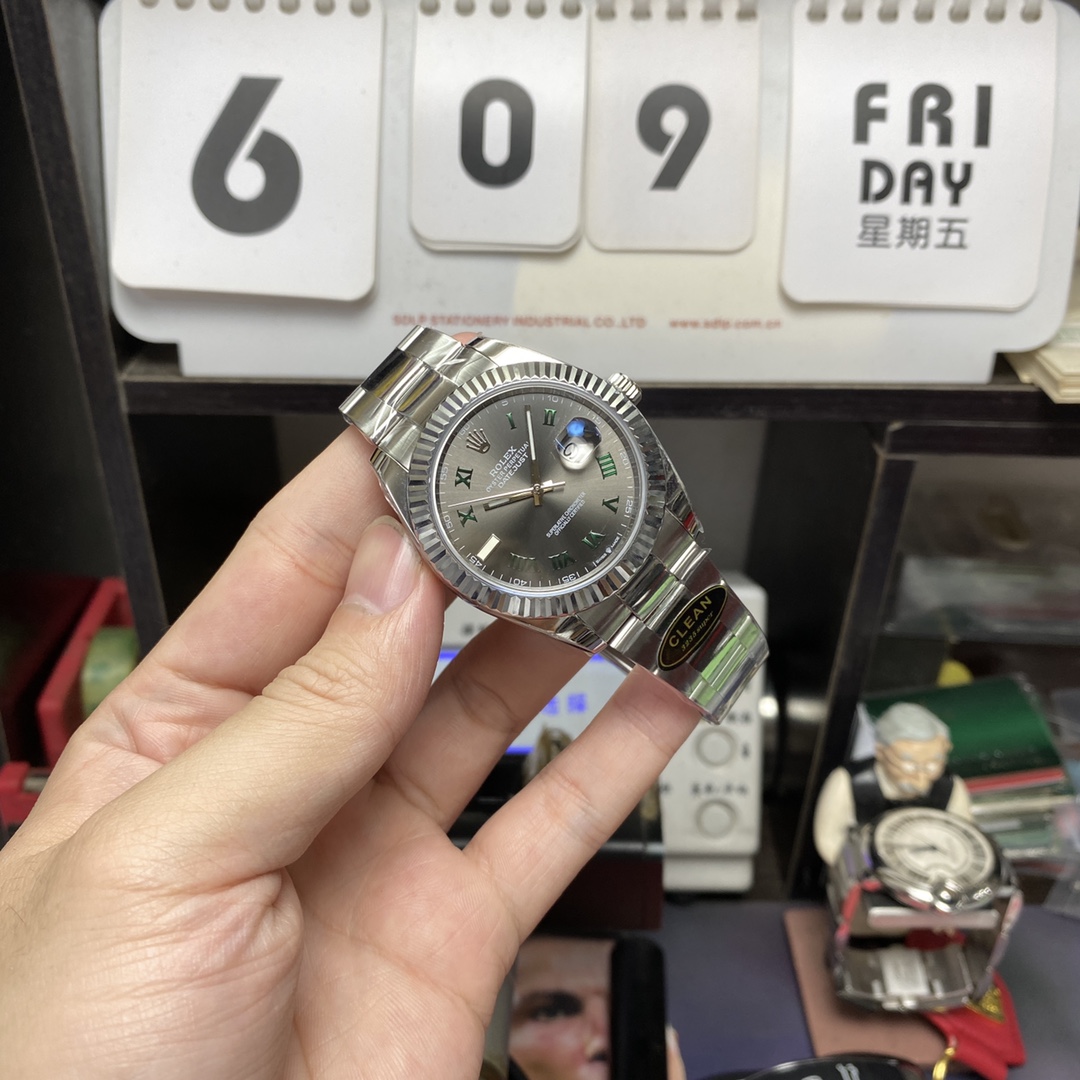 Rolex Datejust series m126334-0021, Grey Dial Green Roman Numerals, 41mm size. Oyster strap